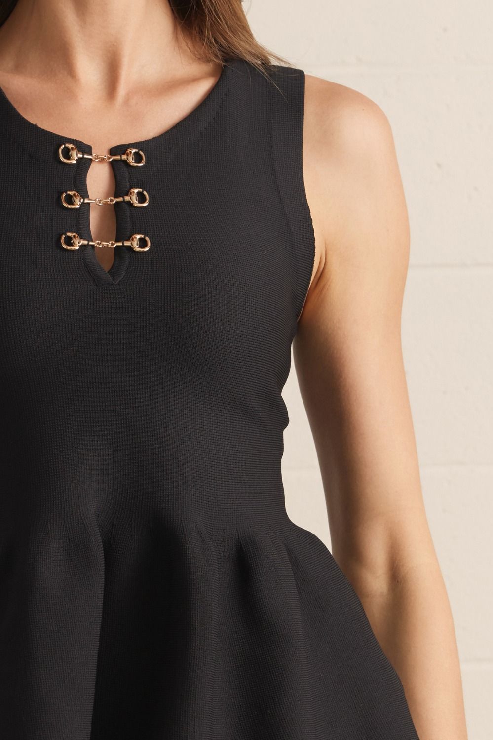 Sleeveless Peplum Knit Top